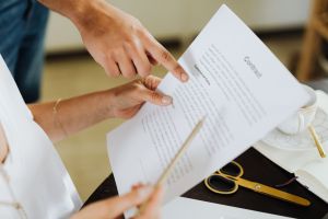 close up of hands working with documents